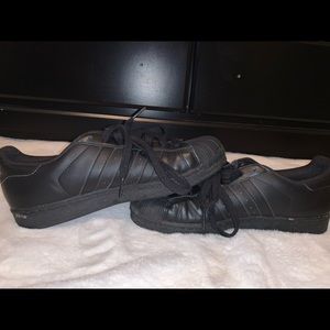 All black adidas superstars